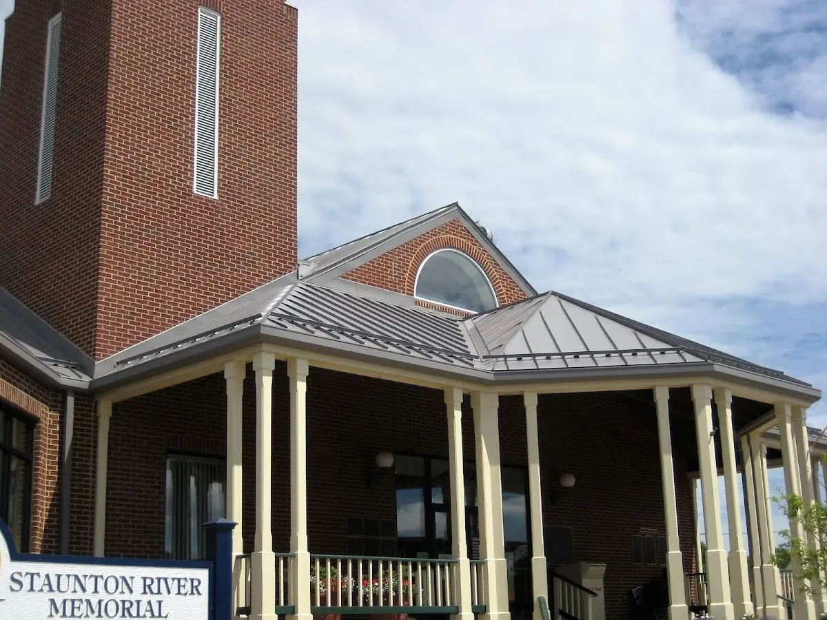 Skilled roofing craftsmen working on a residential roof in Sidney
